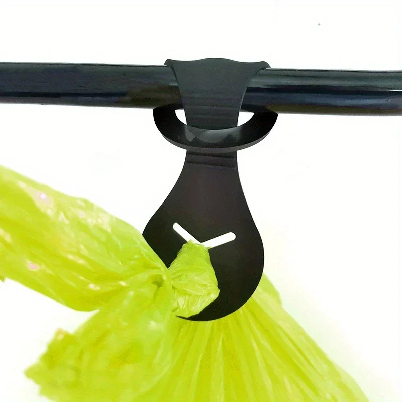 silicone dog poop bag holder with leash clip black white pattern waste bag dispenser with drawstring closure runs bike rides poop bags for dogs details 2